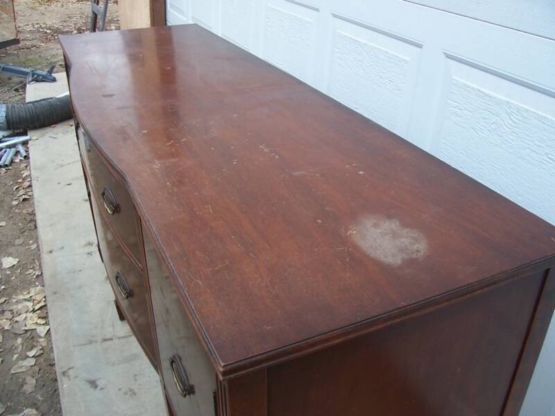 Antique desk with extensive hidden termite damage