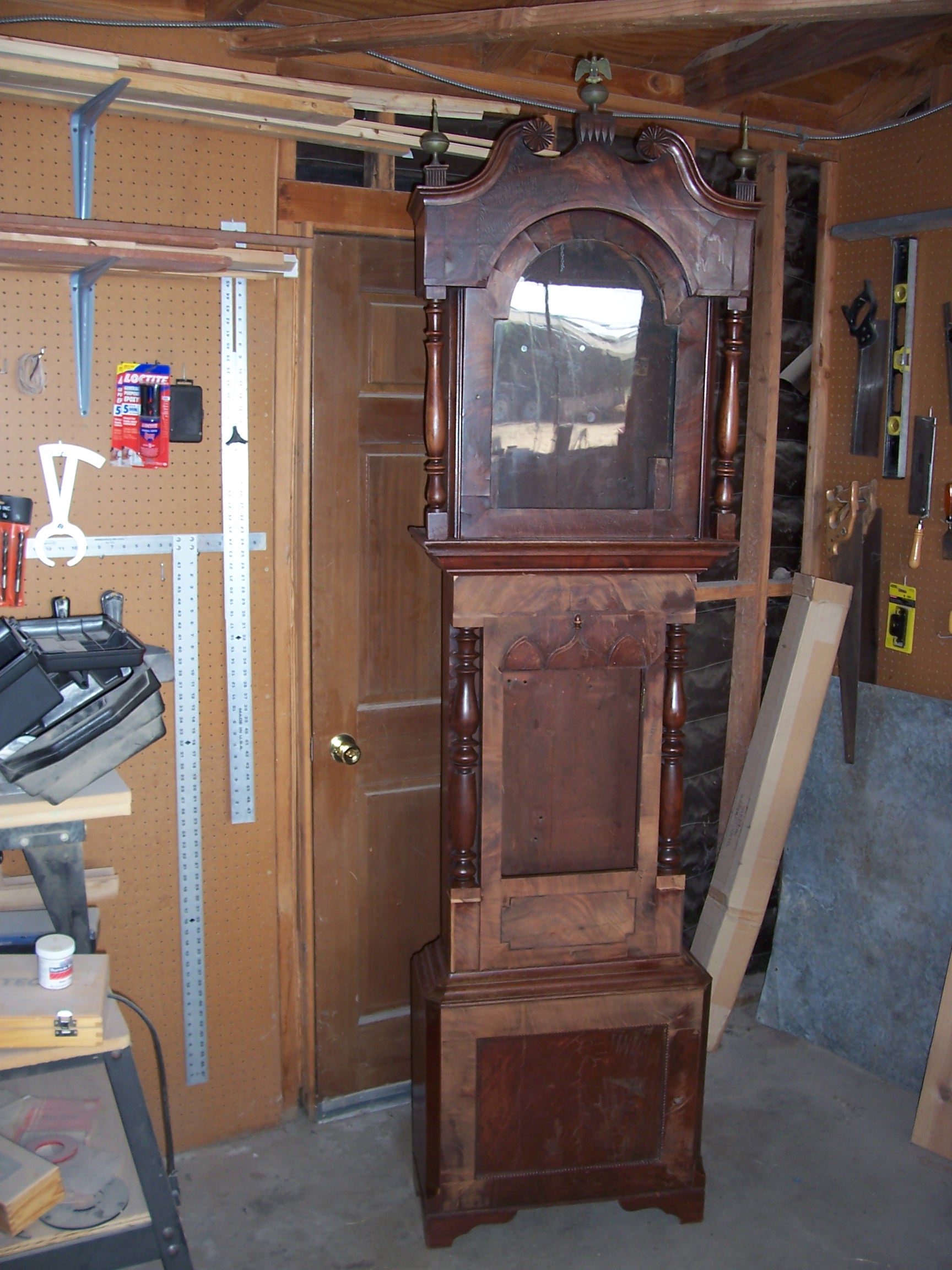 Wooden cabinet with a mirror on top