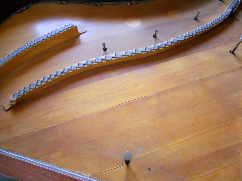 Precision sound board piano restoration for improved tone