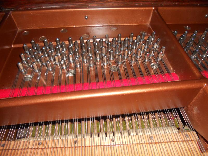 Piano stringing to restore full, rich sound